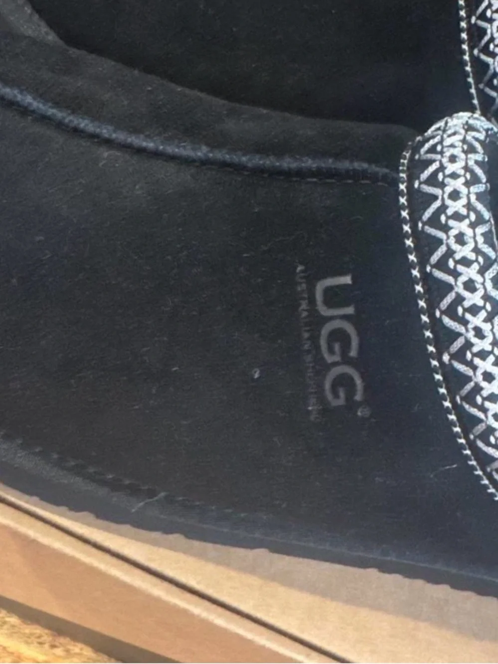 UGG men’s Black Suede Slip-On Moccasin Slippers with Patterned Trim